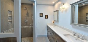 overview of bathroom with custom built reclaimed wood vanity